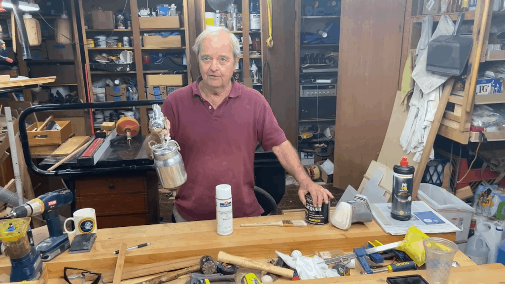 Lacquer vs Varnish: Which Wood Finish To Use 3 Lacquer vs Varnish: Which Wood Finish To Use Man holding a spray can