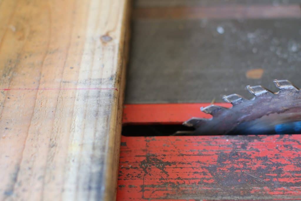 Table saw about to cut wood